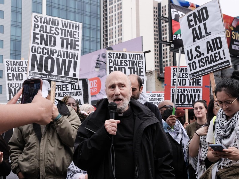 Father George Makhlouf, a retired Antiochian priest born in West Jerusalem prior to the Nakba in 1948 when over 700,000 Palestinians were forcibly displaced from Palestine, speaks to a crowd of protesters gathered in downtown Atlanta to protest Israel's ongoing genocide in Gaza
