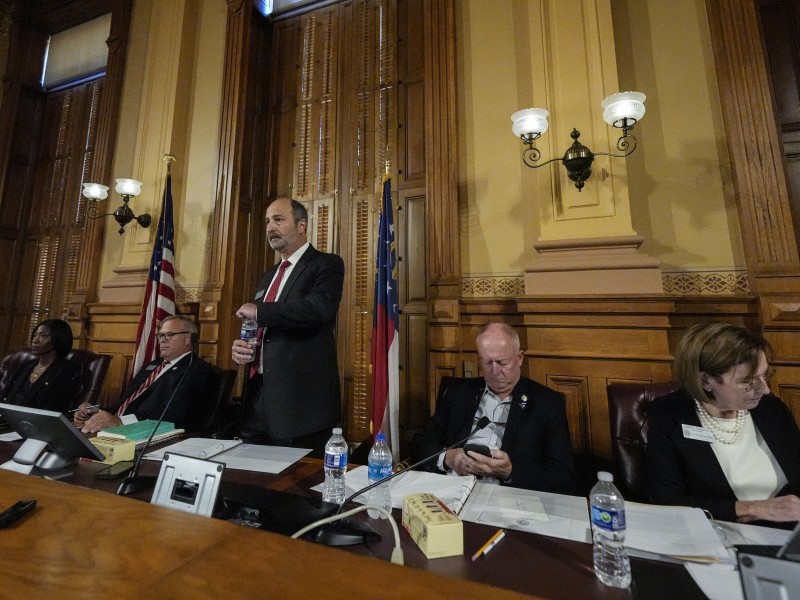 Georgia's State Election Board members discuss proposals for election rule changes at the state capitol, Friday, Sept. 20, 2024, in Atlanta.