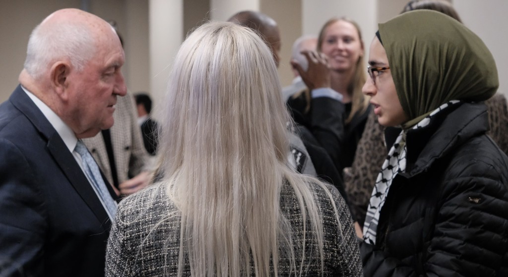 Georgia Tech Student Renee Alnoubani speaks with Georgia Board of Regents Chancellor, and former Georgia Govenor Sonny Perdue as students from several Georgia Universities stage a sit-in at a Georgia Board of Regents meeting, to demand that the University System of Georgia disclose their financial partnerships with, and divest from companies that are invested in Israel's genocide campaign in Palestinian territories.