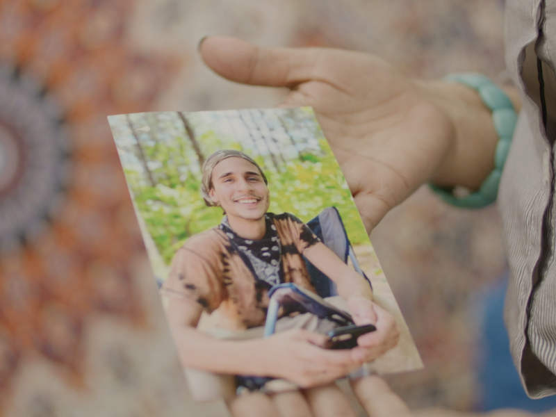 Belkis Teran holds a picture of her child, Tortuguita.