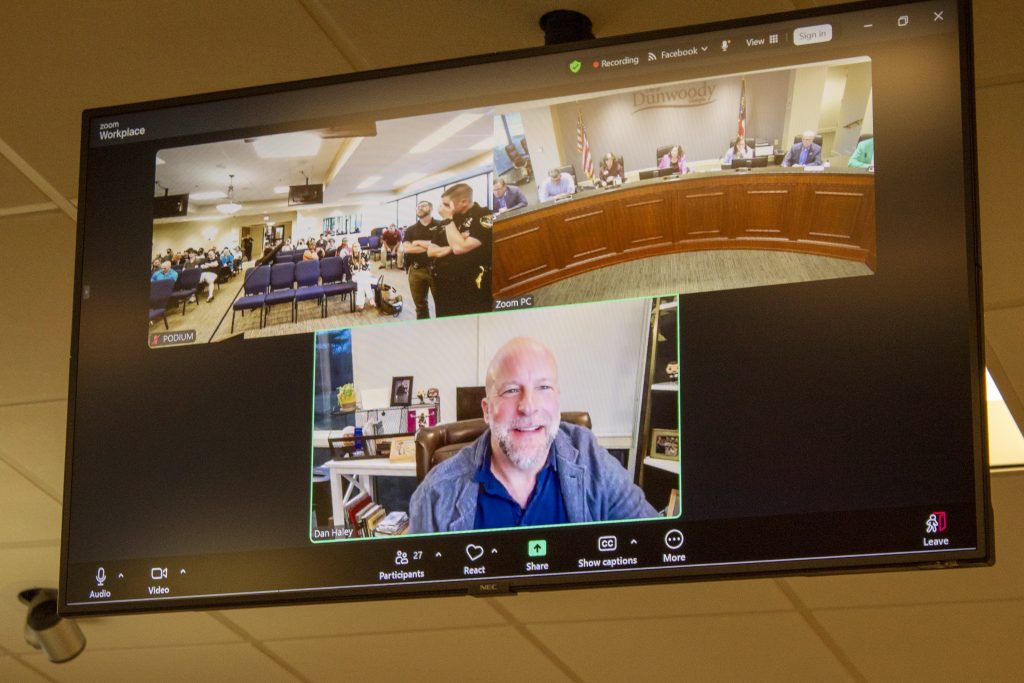 Dan Haley, Flock Safety's chief legal officer, answers questions from the Dunwoody City Council via zoom. 