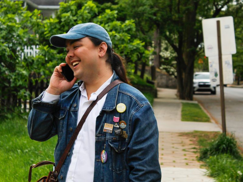Bentley Hudgins, candidate for Georgia House District 90, talks to a campaign member in between canvassing stops in Candler Park, Atlanta on Monday, April 6, 2026. (Matt Scott / ACPC)