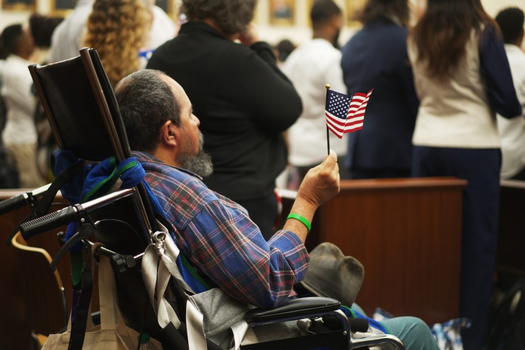 Dozens of immigrants became U.S. citizens at an Atlanta courthouse Friday, celebrating the end of a yearslong process. But even as families cheered, new federal policies are driving U.S. citizenship delays in Atlanta and nationwide—leaving thousands of applicants stuck in limbo after passing every requirement.