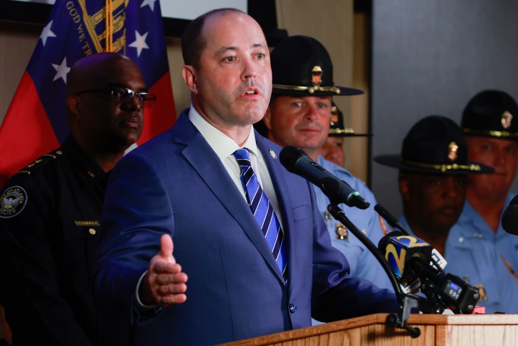 FILE - Georgia Attorney General Chris Carr speaks during a news conference at the Georgia Department of Public Safety in Atlanta on Sept. 5, 2023. Nearly three years later, Carr indicted 3 of the 61 on additional charges in Cobb County. 