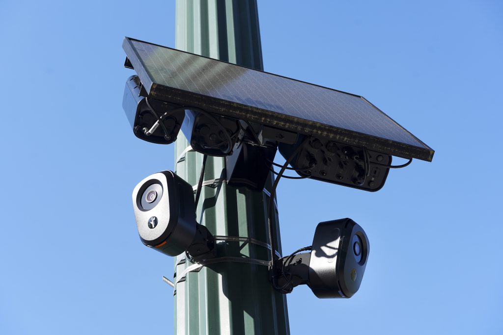 Flock Cameras can be seen outside of Dunwoody City Hall as people attend a city council meeting to discuss Flock Cameras at Dunwoody, Georgia, U.S., April 14, 2026. ACPC/Megan Varner