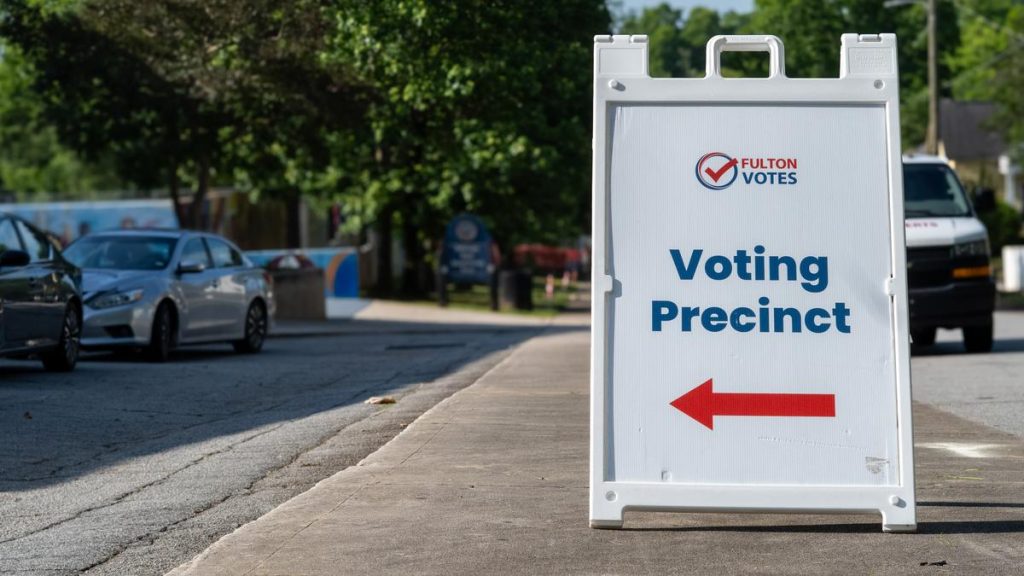 A sign guides voters to the Perkerson Park voting precinct in Atlanta, Georgia, during the May 19, 2026, primary election. 